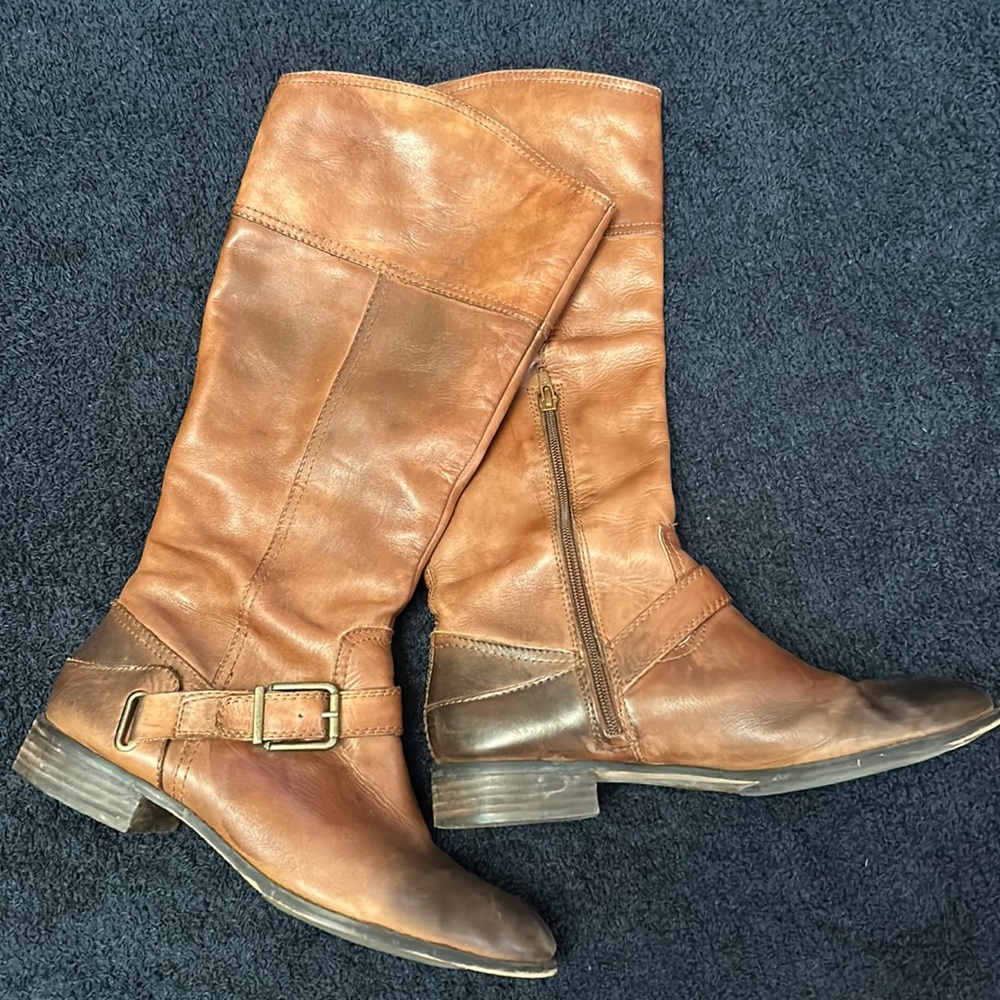 Beautifully broken in knee-high boot